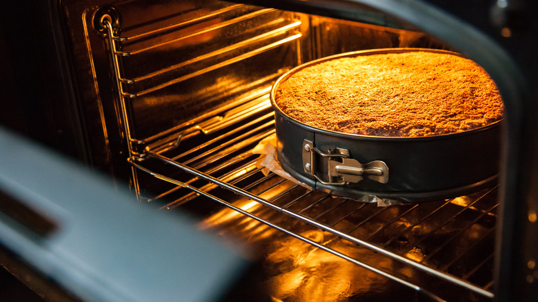 Cake baking in an oven