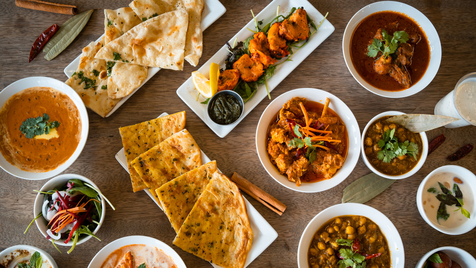 The Reason You Should Share Food When Dining At An Indian Restaurant