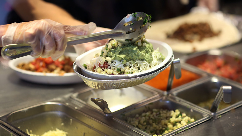 Chipotle bowl being made 