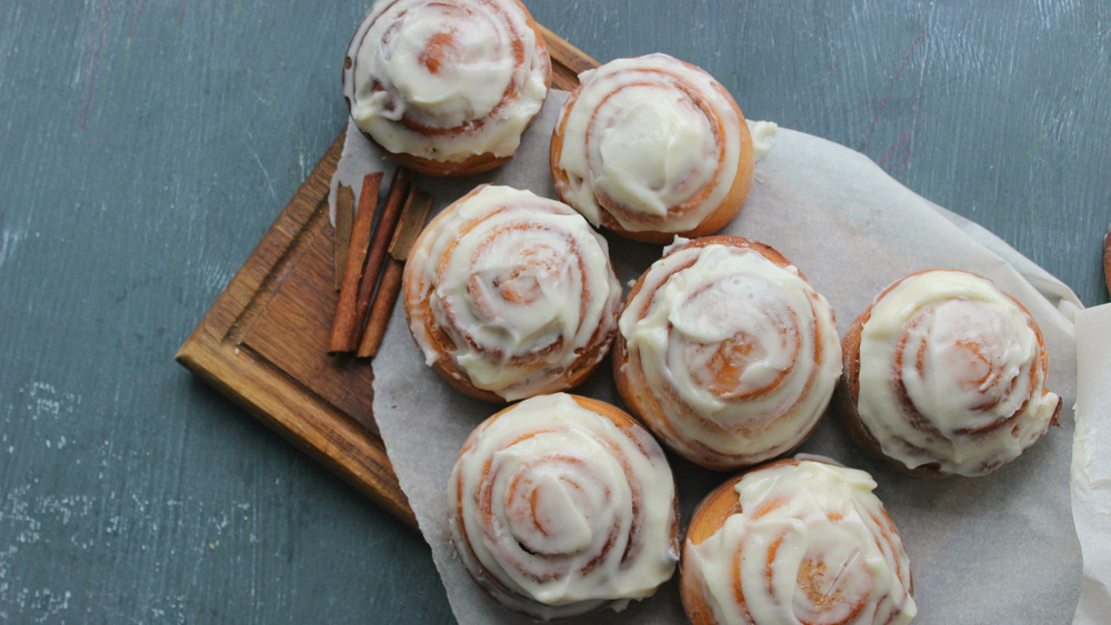 Cinnamon rolls on cutting board