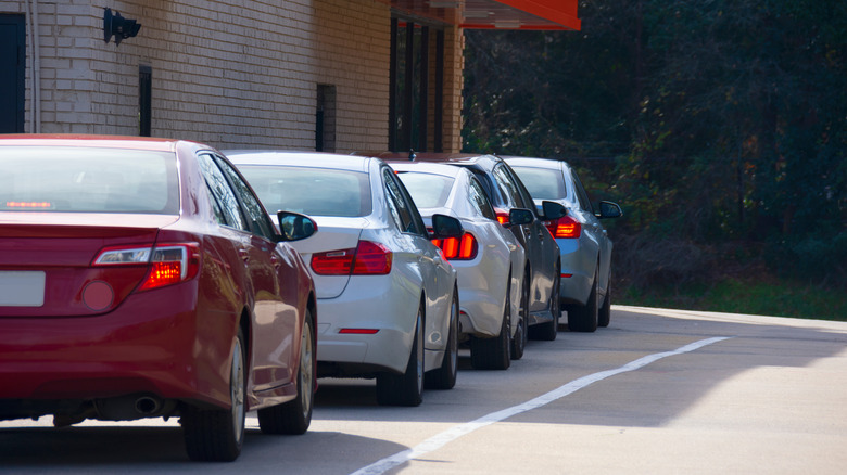 cars waiting in drive-thru