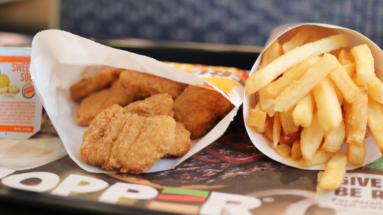 Chicken nuggets and fries on tray