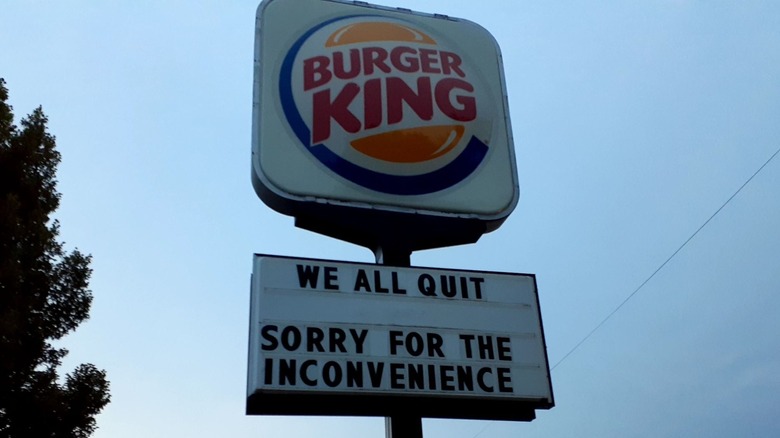 Burger King logo and marquee with quit message