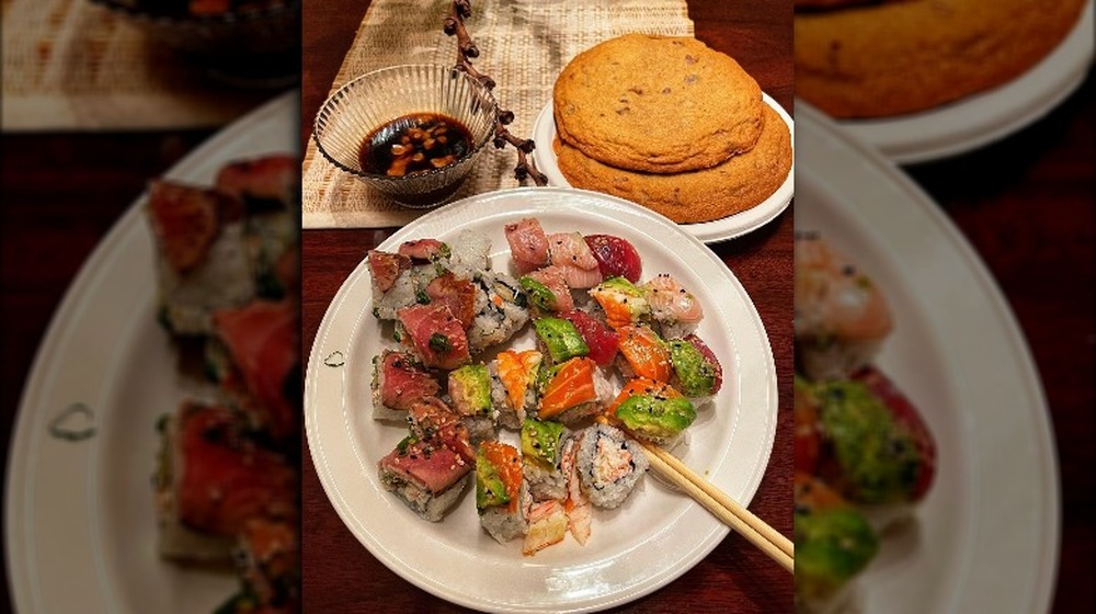 Sushi with wasabi sauce and chocolate chip cookies