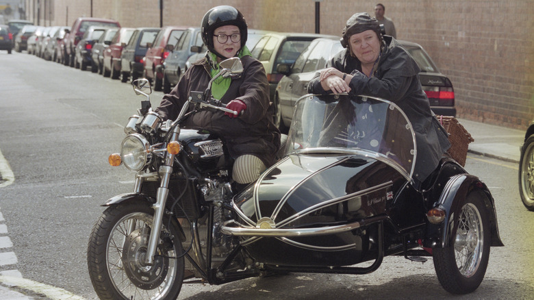 Jennifer Paterson and Clarissa Dixon on motorcycles