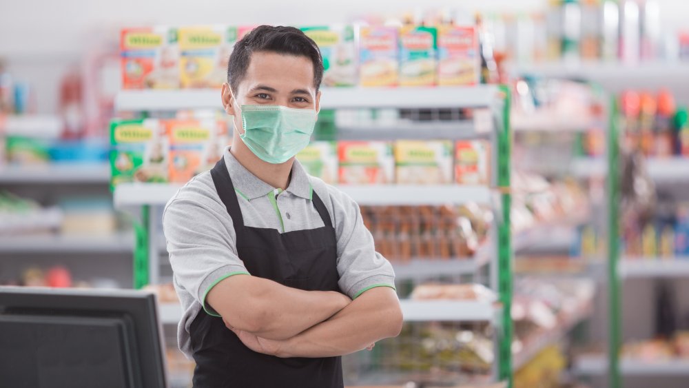 cashier wearing a face mask