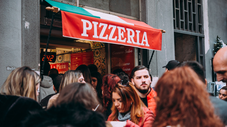 crowd in line at Naples pizzeria