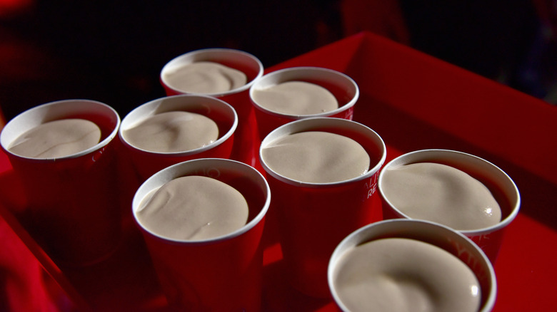 Wendy's chocolate frosty in array of red cups