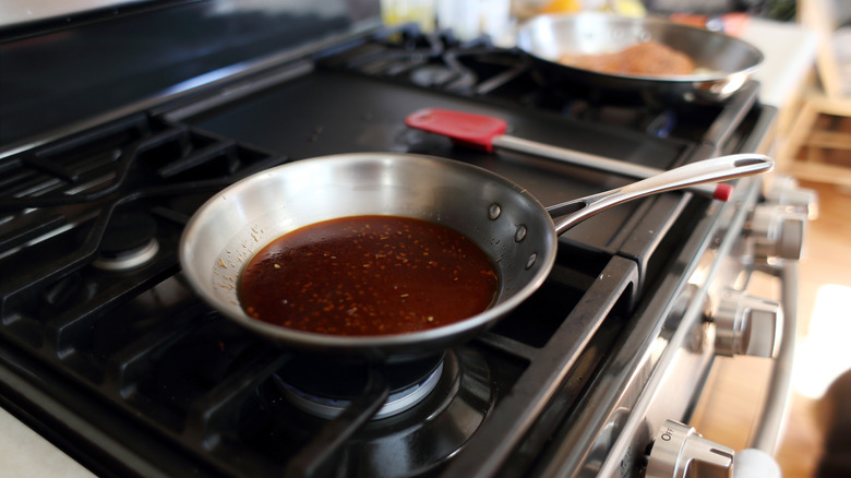 brown sauce in pan on stove 