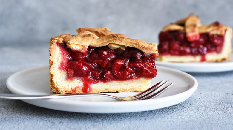 Slice of cherry pie on plate