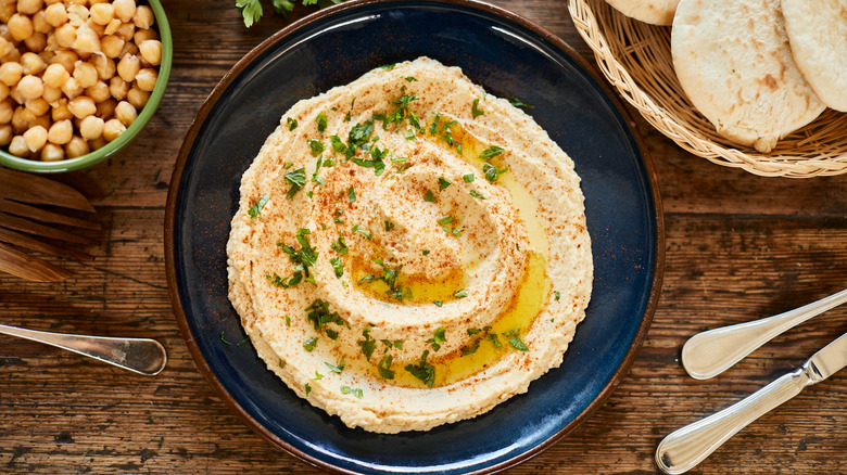 hummus with olive oil and herbs