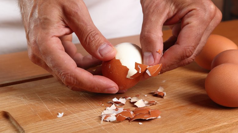 peeling hard-boiled eggs