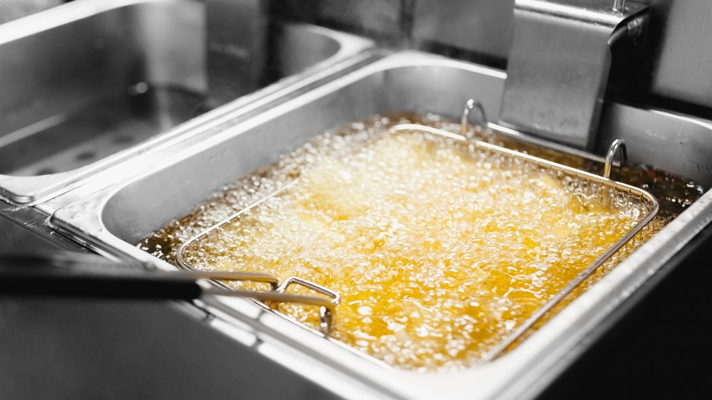 restaurant fryer bubbling with oil