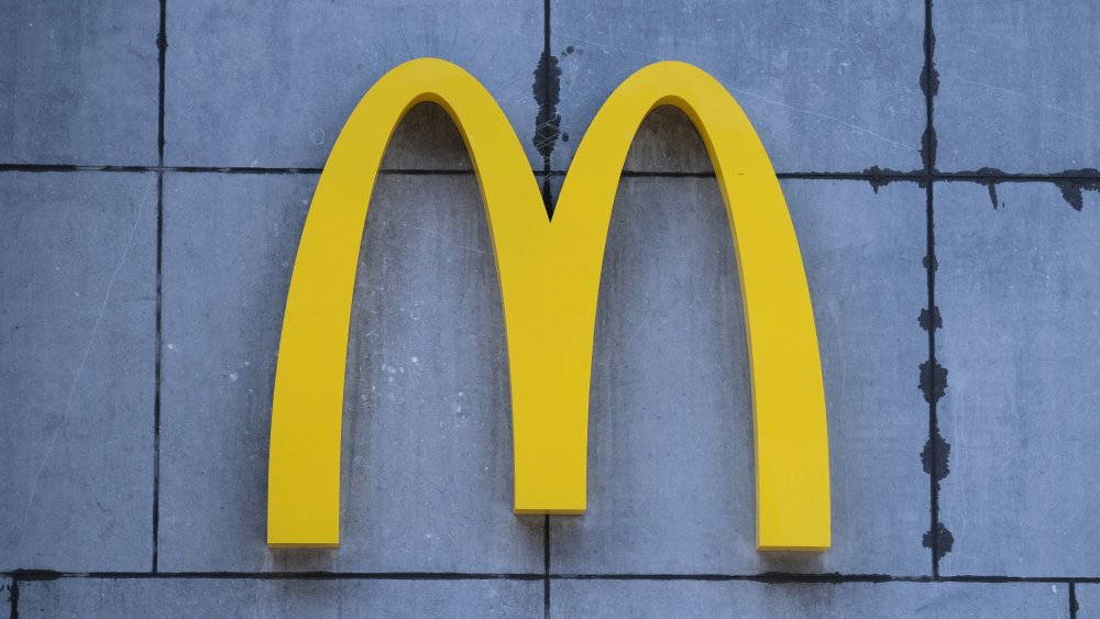 mcdonald's golden arches sign on wall