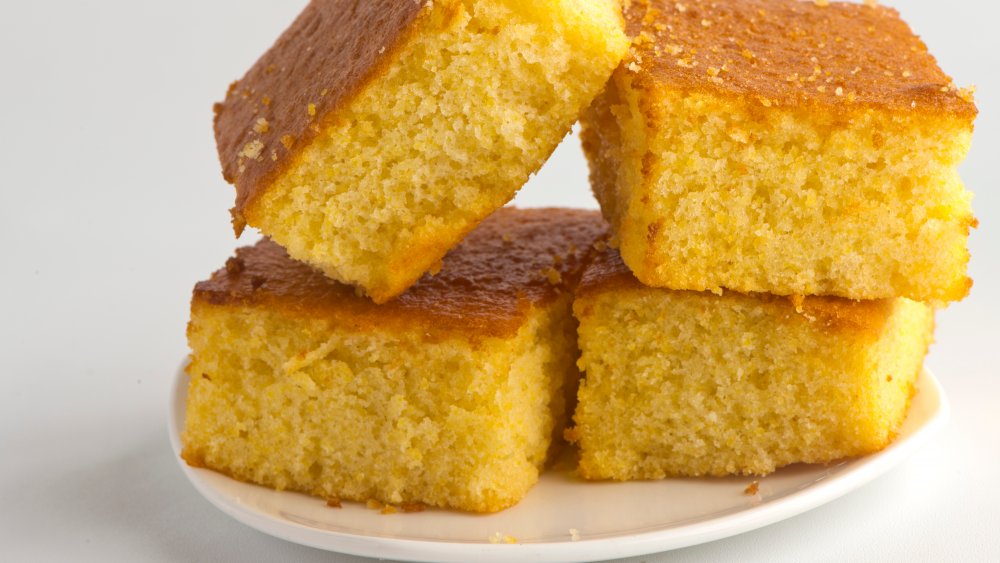 Cornbread cut up on a plate