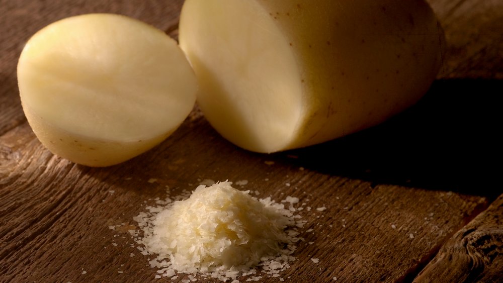 whole potatoes next to potato flakes