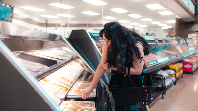 Woman shopping in grocery store