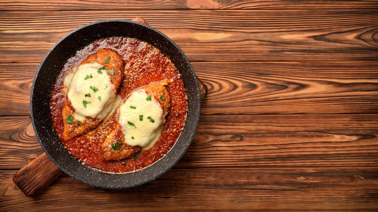 saucy chicken parmesan in a pan