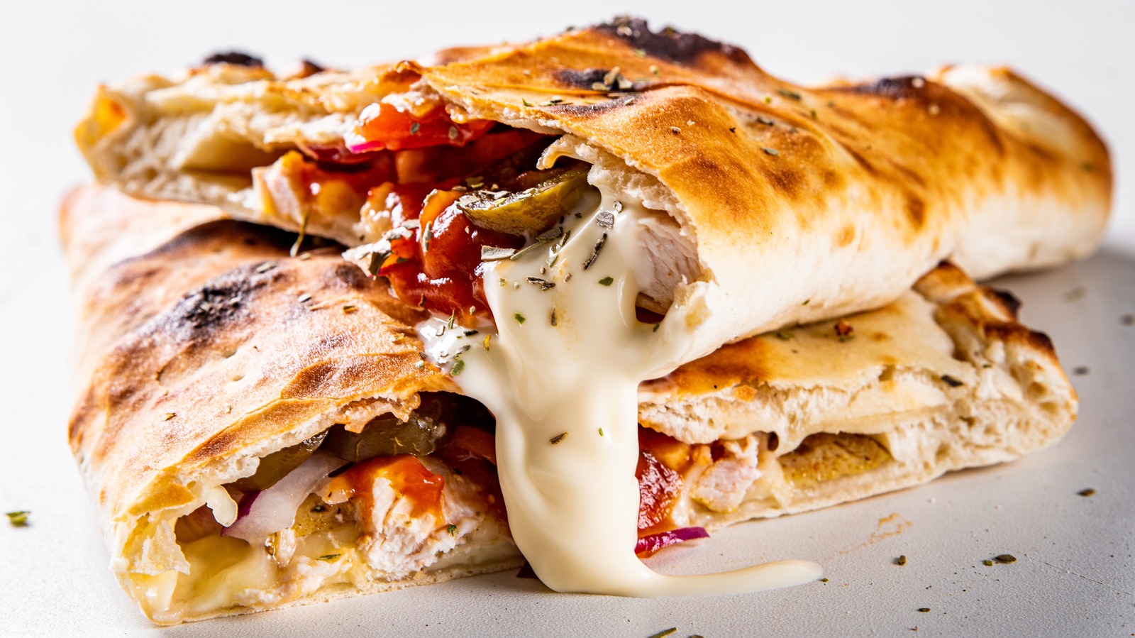 the-secret-to-properly-adding-cheese-to-a-calzone