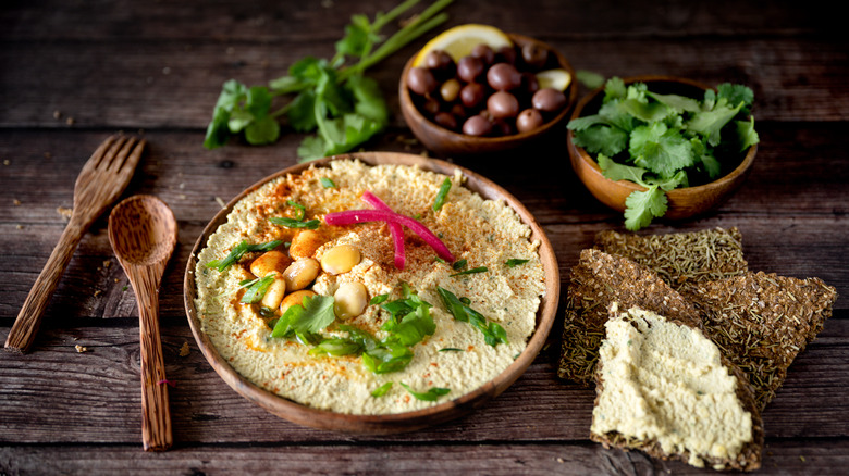 hummus with vegetable garnish