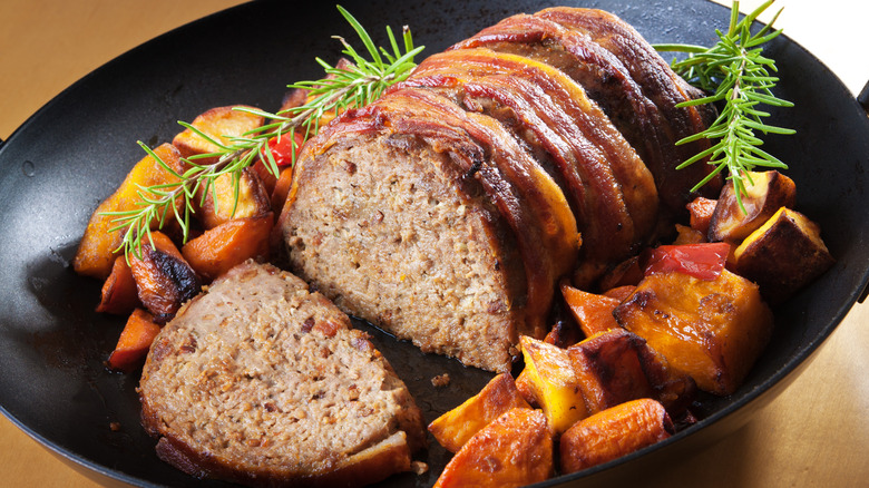 sliced meatloaf with vegetables