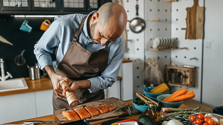 Chef preparing salmon