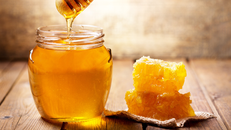 jar of honey and honeycomb