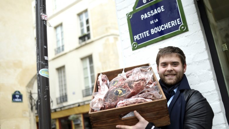 Alexandre Polmard serves Kobe beef