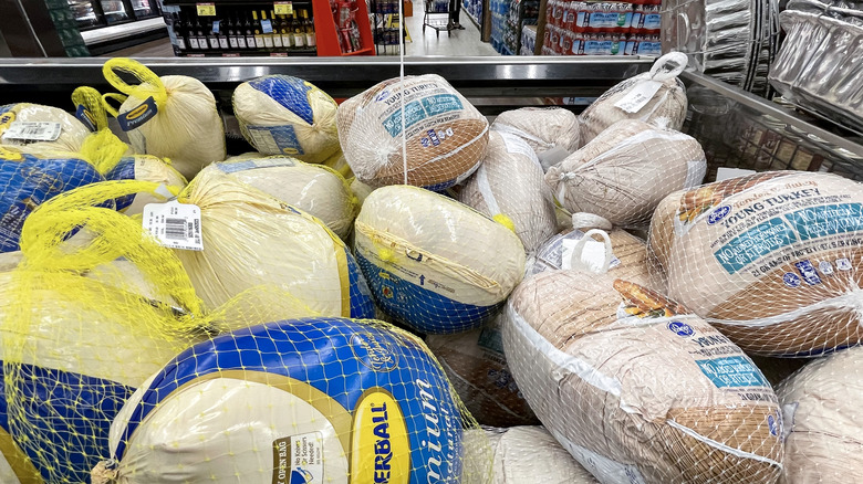 Whole turkeys in grocery store