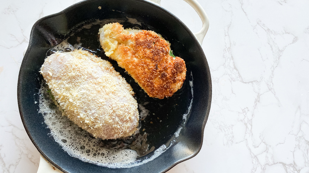 chicken kiev being fried