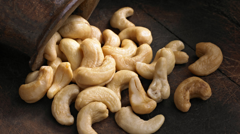 cashews on brown background