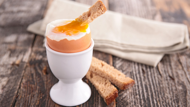 Soft-boiled egg with toast