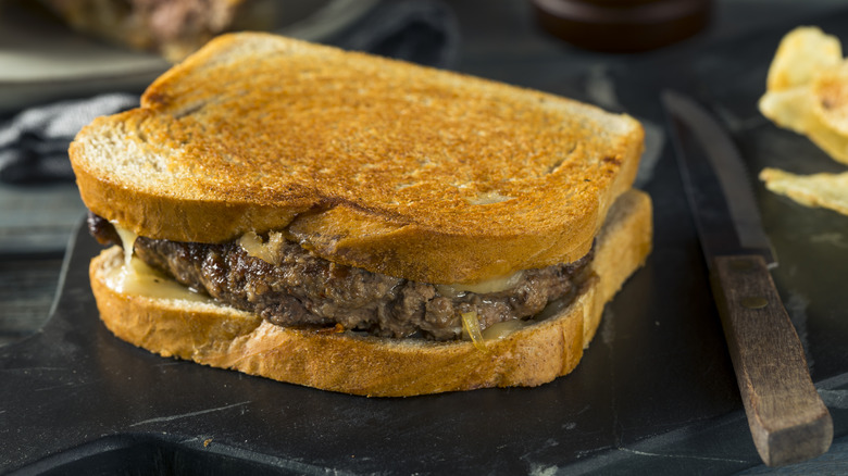 patty melt next to knife