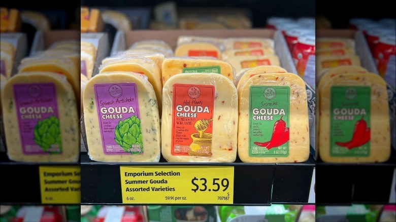 gouda cheeses on a shelf