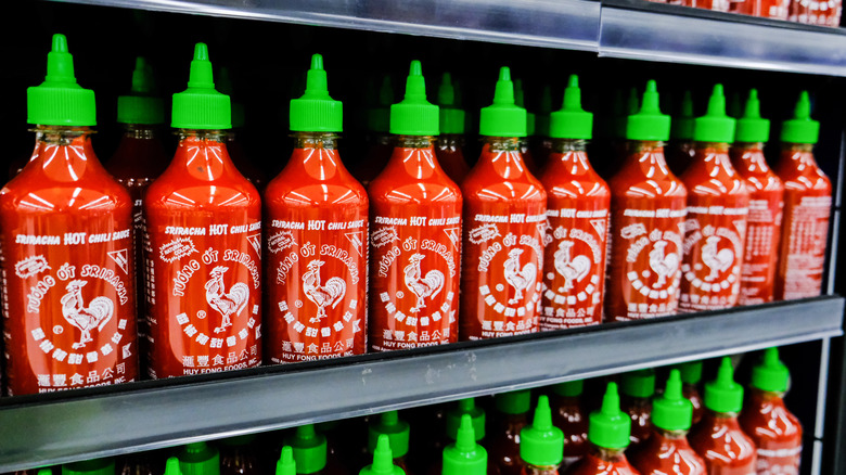 Sriracha hot sauce on grocery store shelf