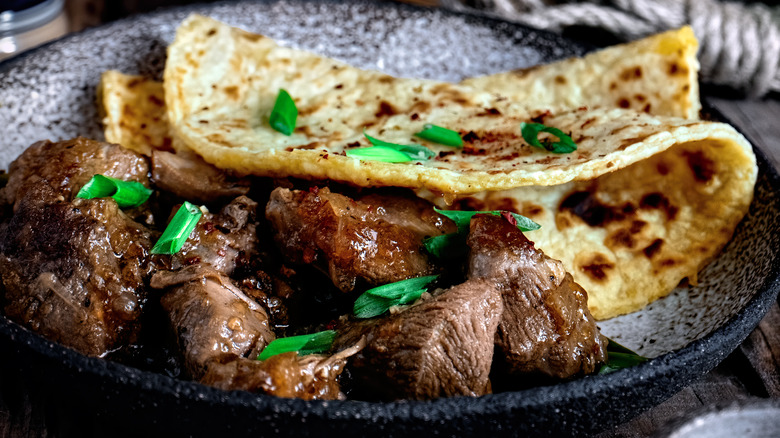 Lefse pancakes served with meat