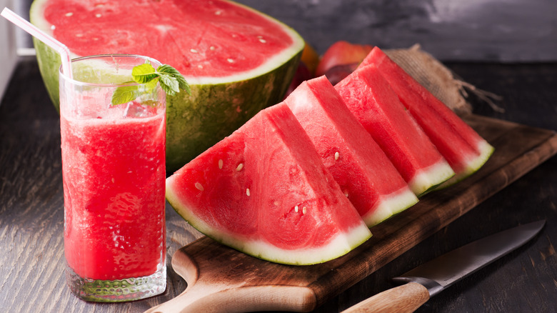 Sliced watermelon with drink