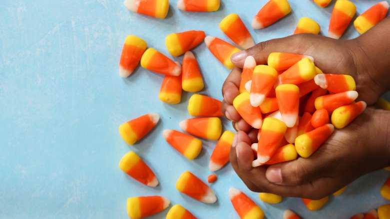 holding candy corn