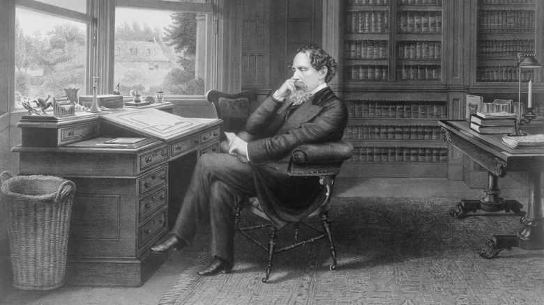 Charles Dickens in his study