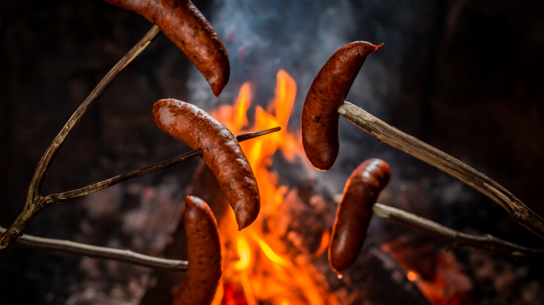 sausages over fire