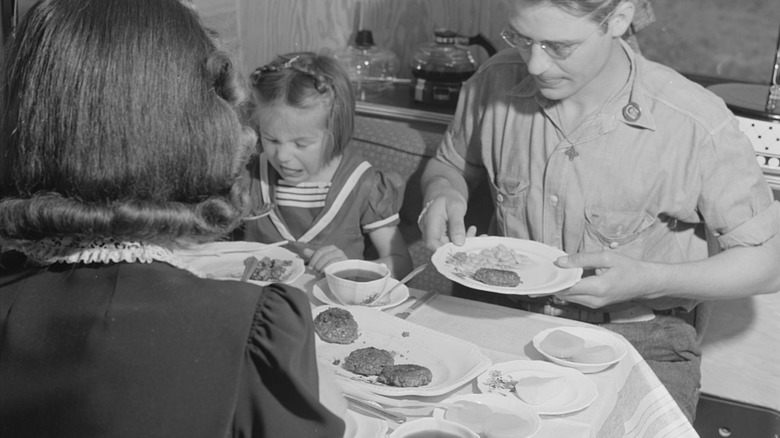 Black and white photo family dinner