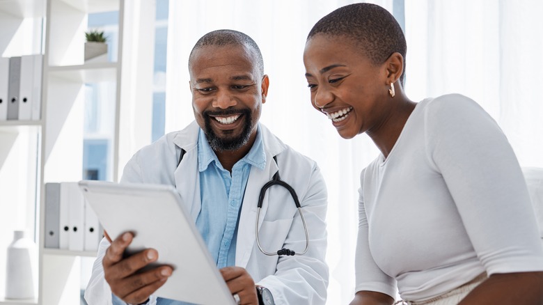 doctor talking to patient