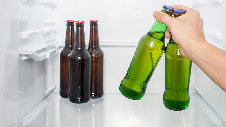 Taking beer from refrigerator