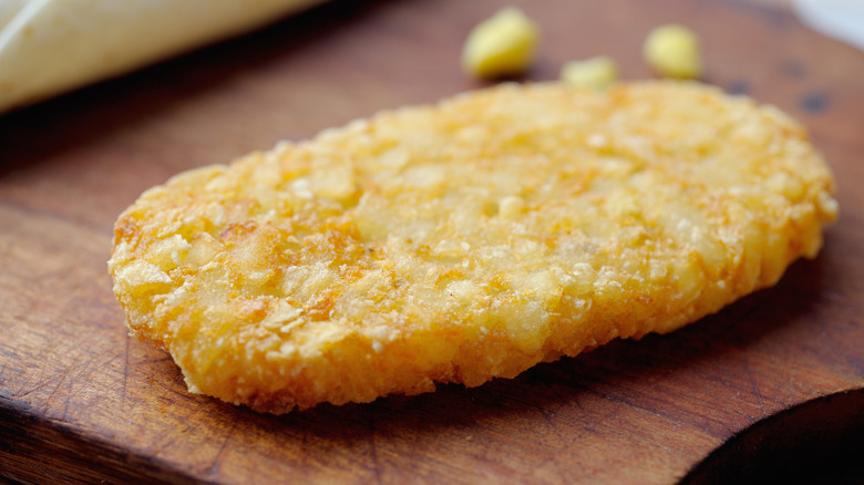 Hash brown on wooden cutting board