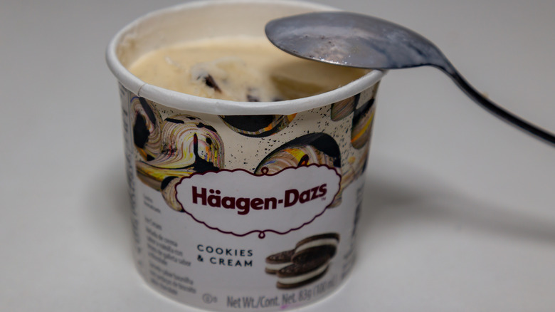 Pint of Cookies & Cream Häagen-Dazs with spoon