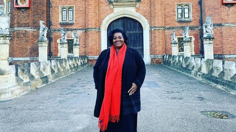 Alison Hammond outside grand building