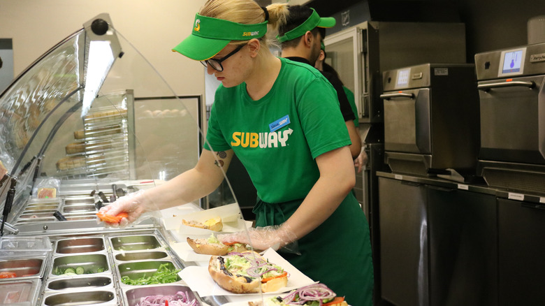 Subway employee at work