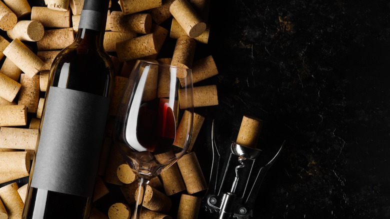 red wine bottle with corks