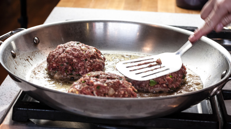 Searing burger in pan