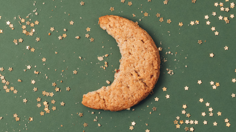 Moon-shaped biscuit with gold stars